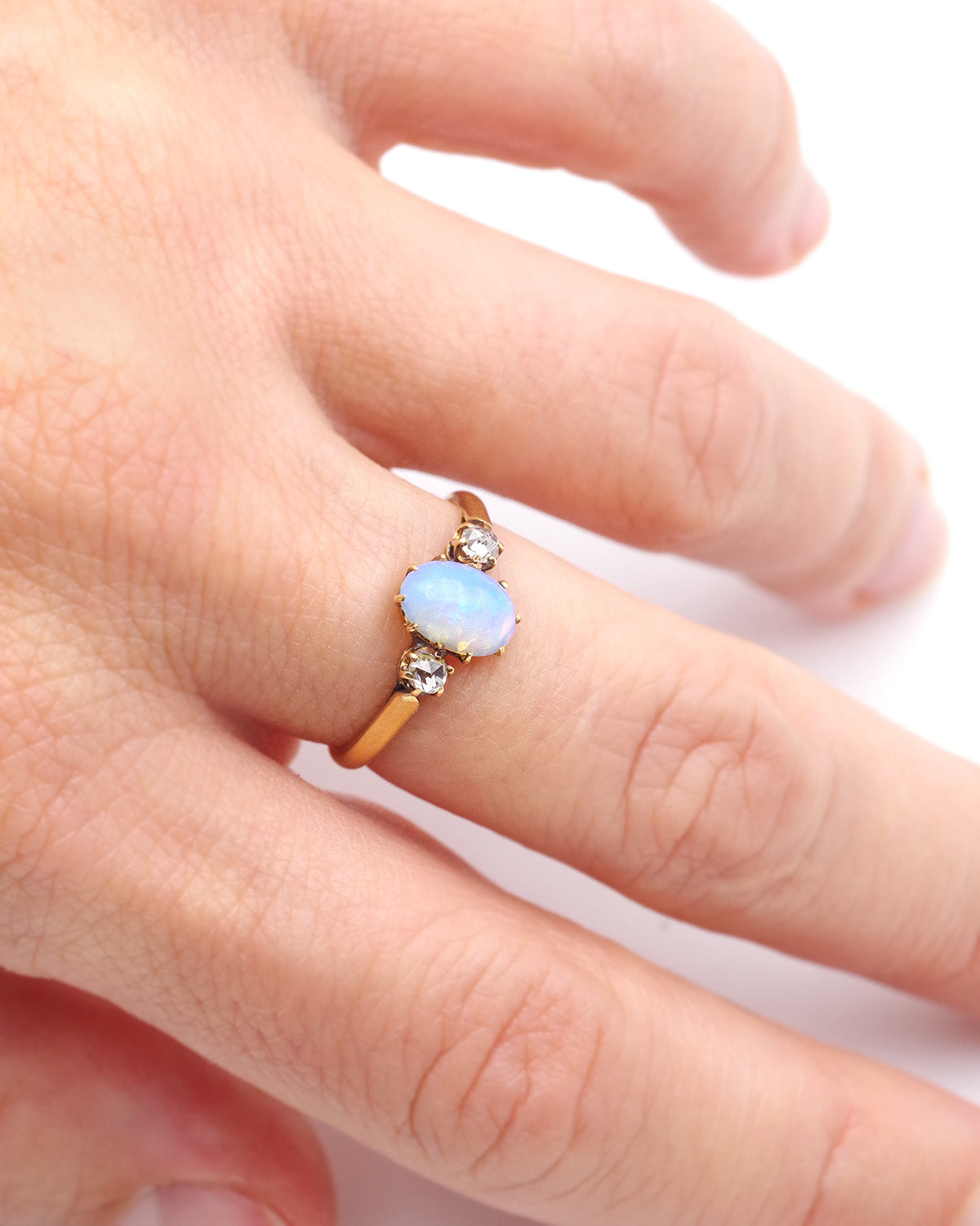 Opal diamond ring in gold