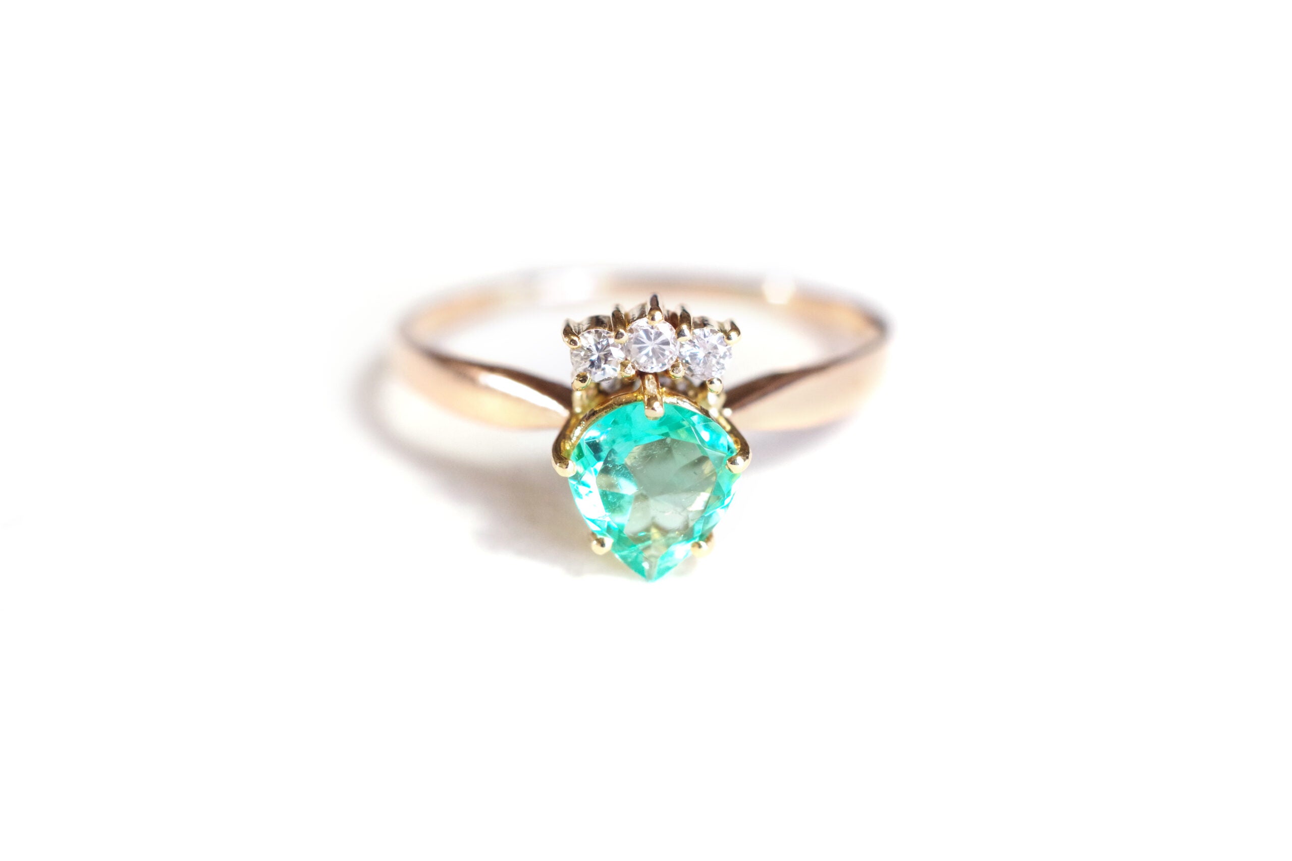 emerald crowned ring in gold