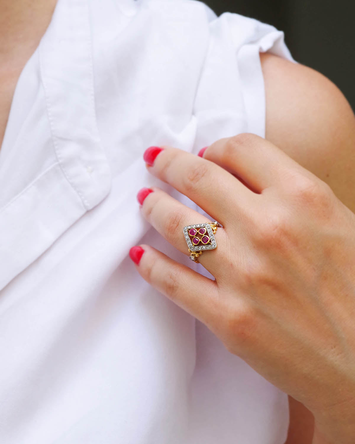 Lozenge ruby diamond cluster ring