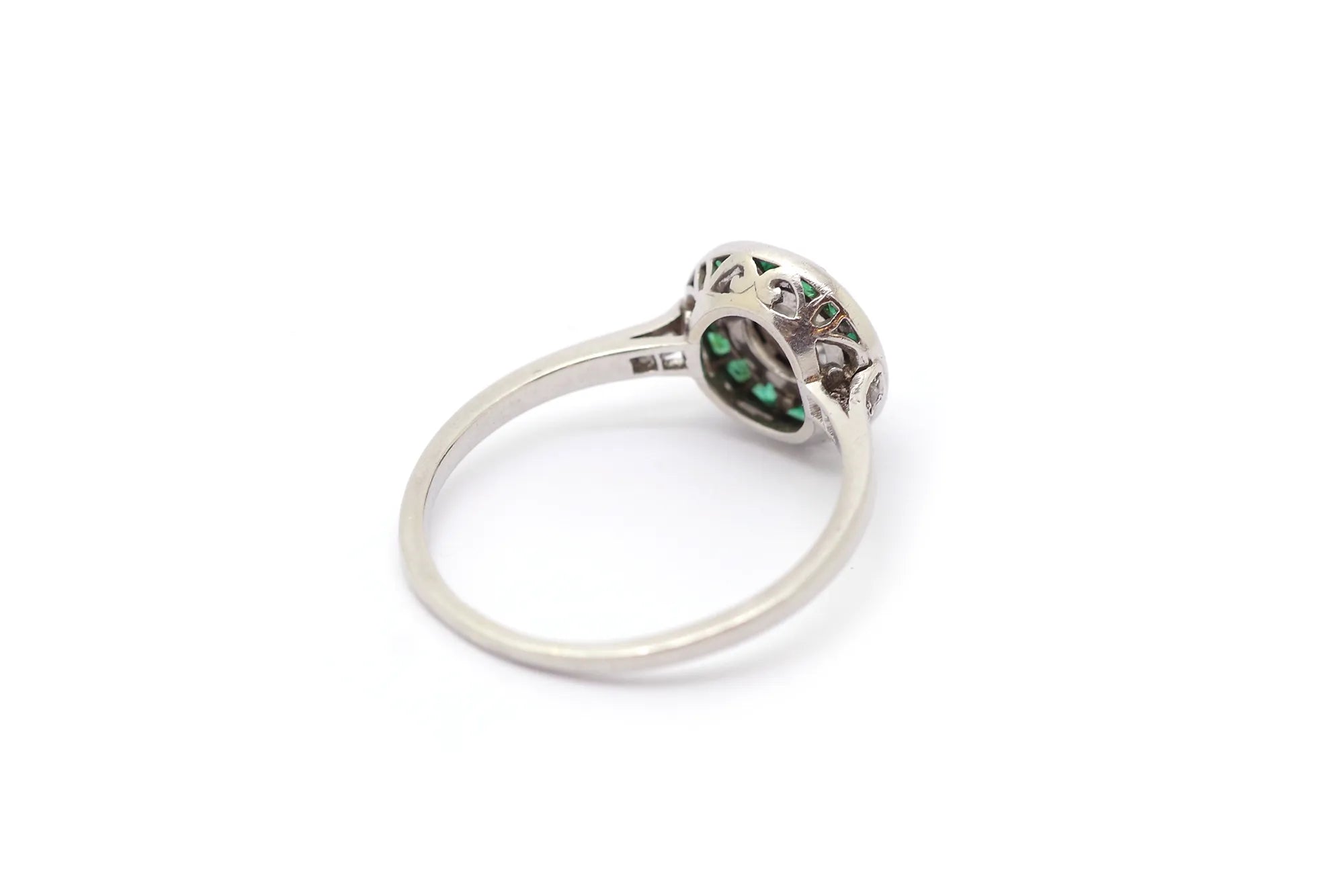 Platinum diamond and emerald ring