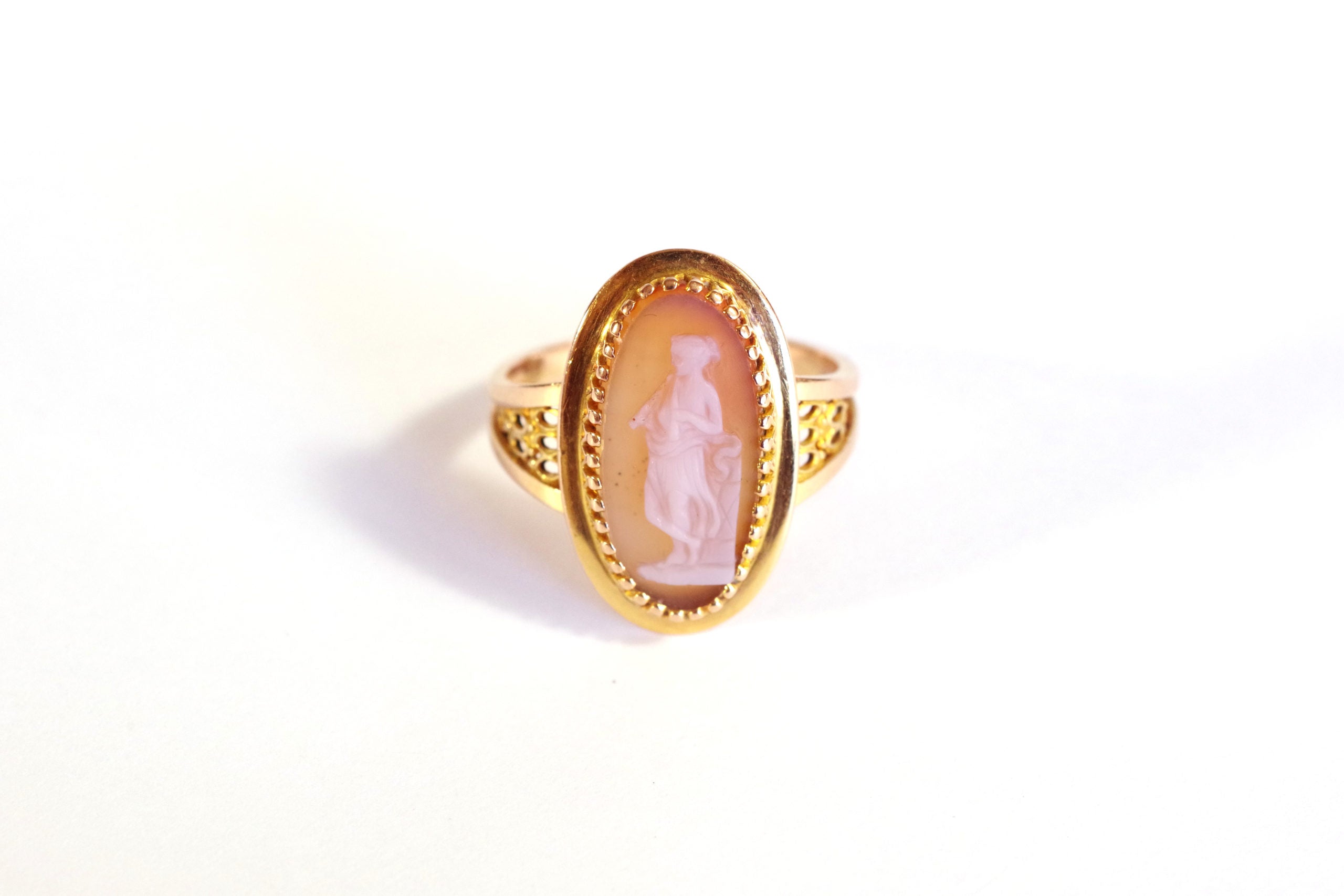 antique cameo ring woman plays aulos