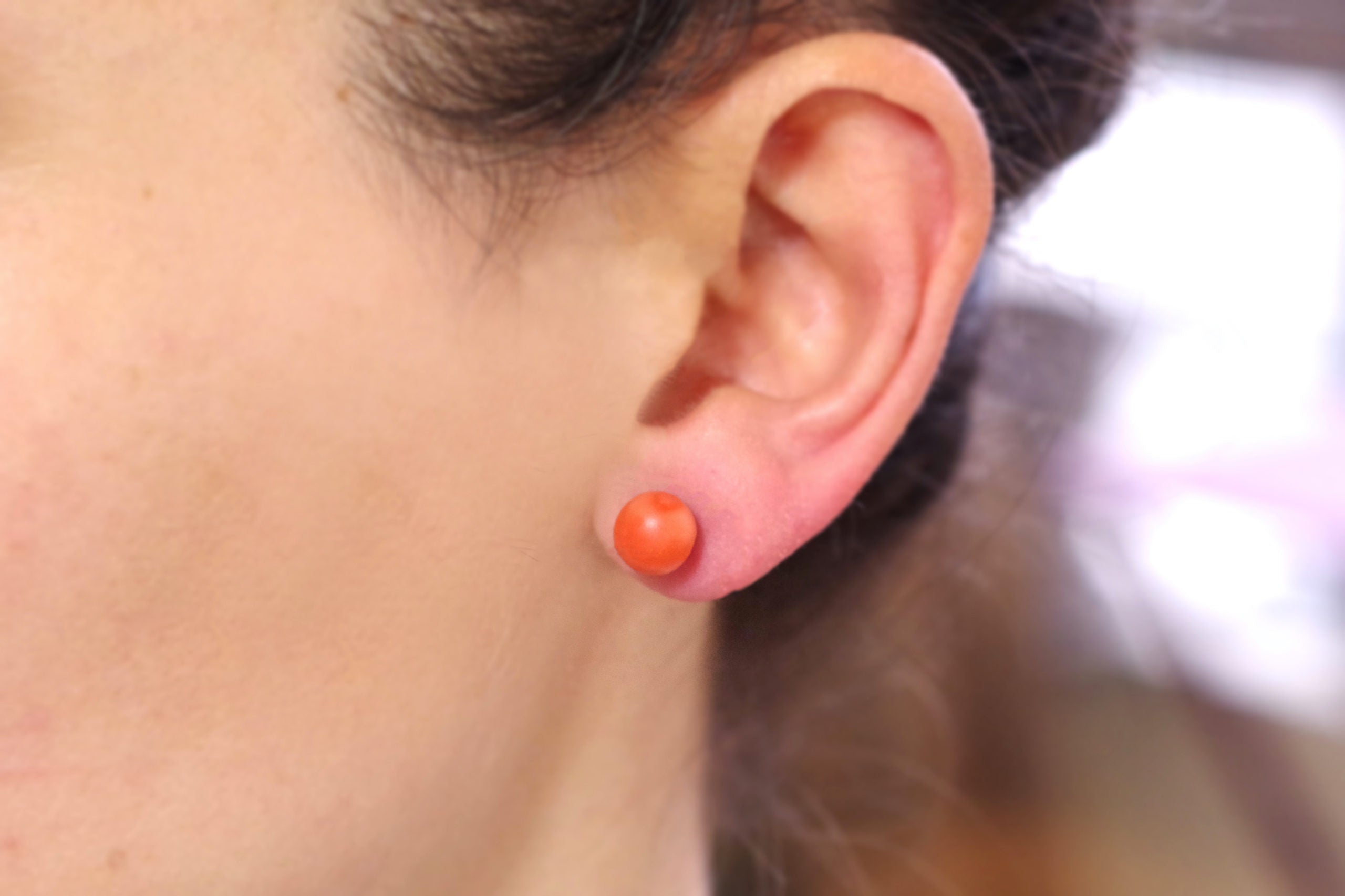 puces d'oreille Art Deco corail