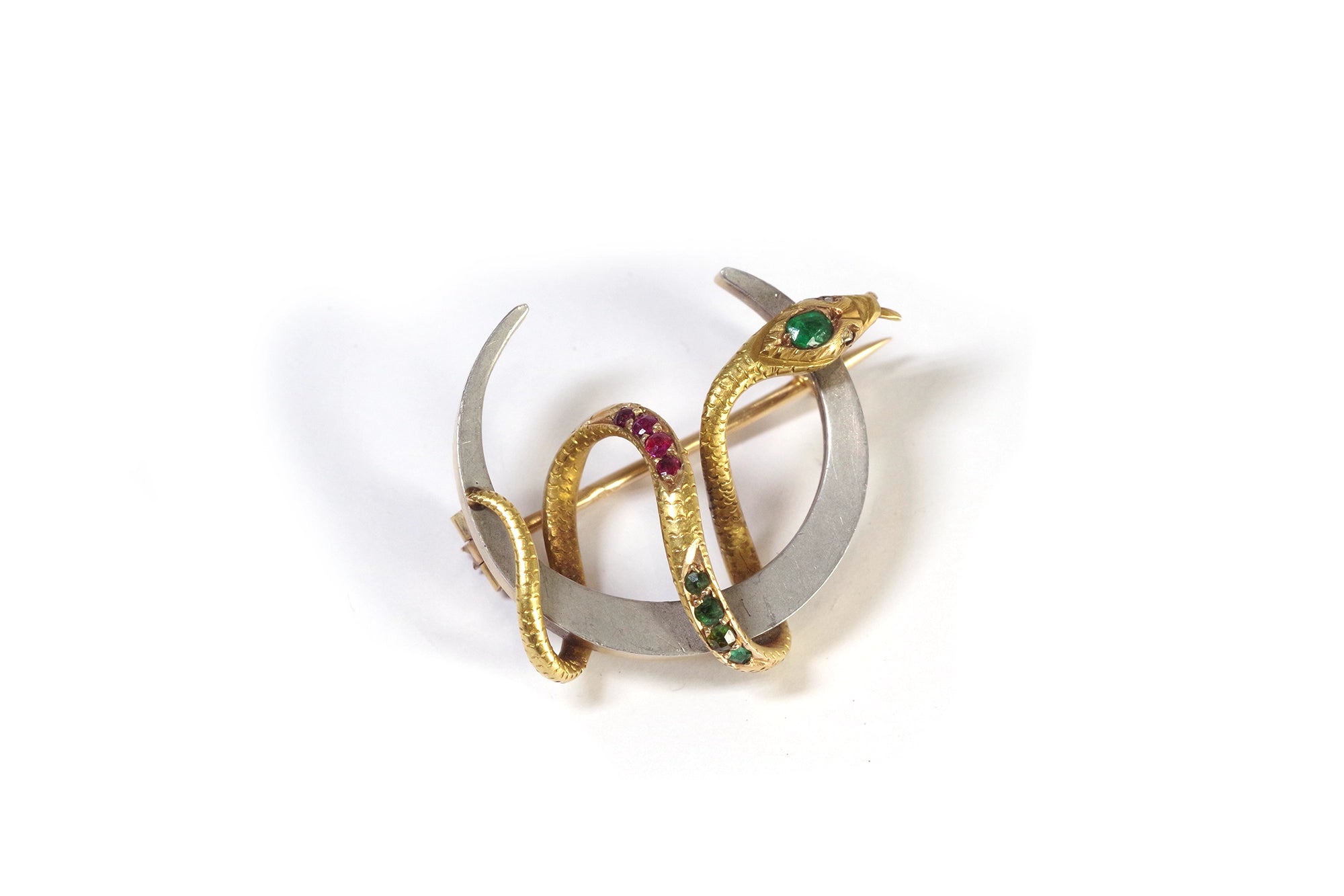 Gold and platinum crescent snake brooch