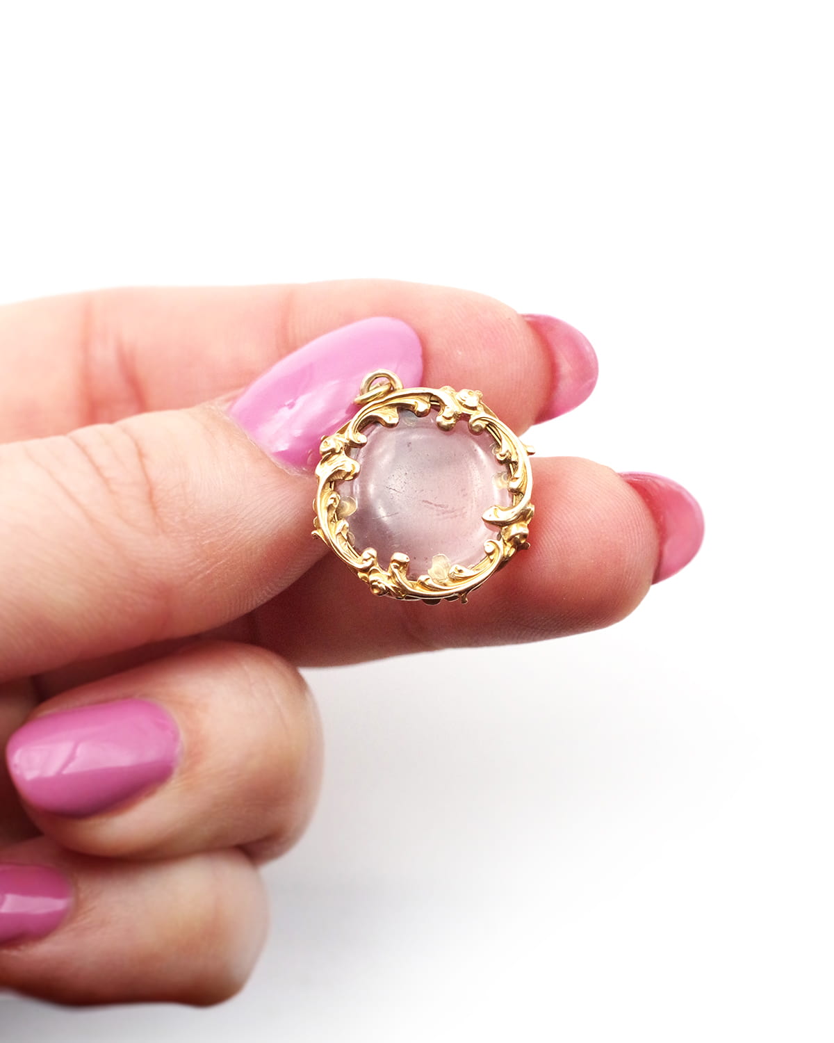 Charm locket pendant in gold