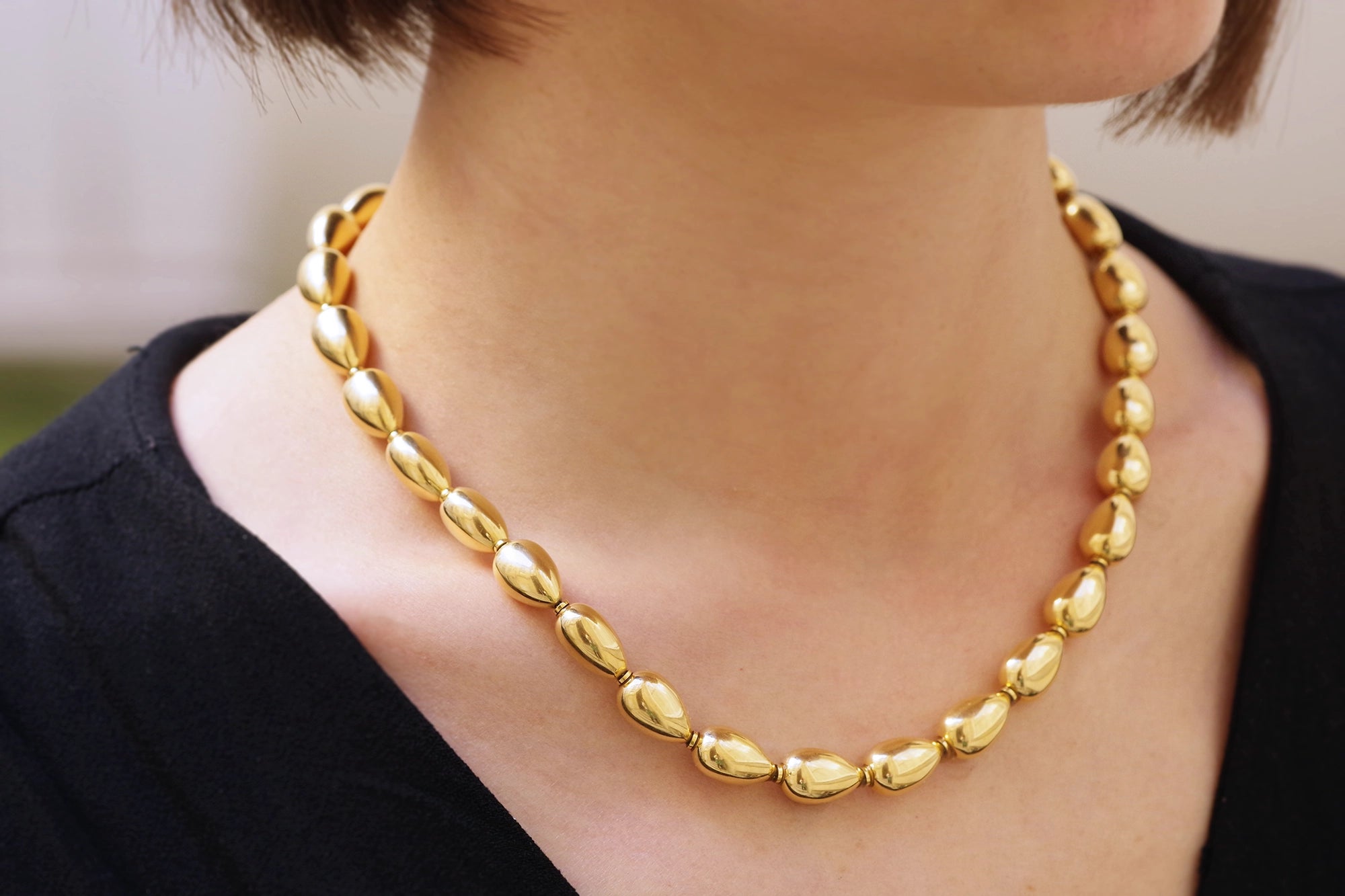 Collier moderne graine d'or