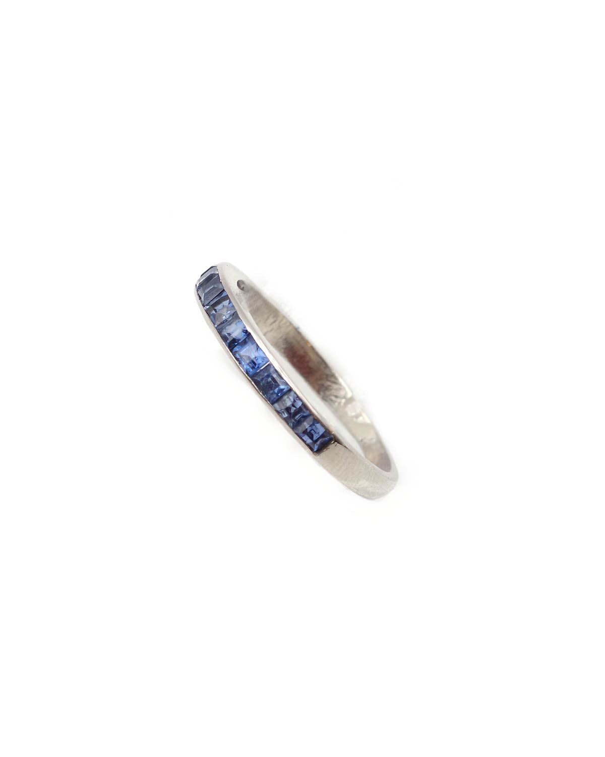 Half eternity sapphire ring in platinum
