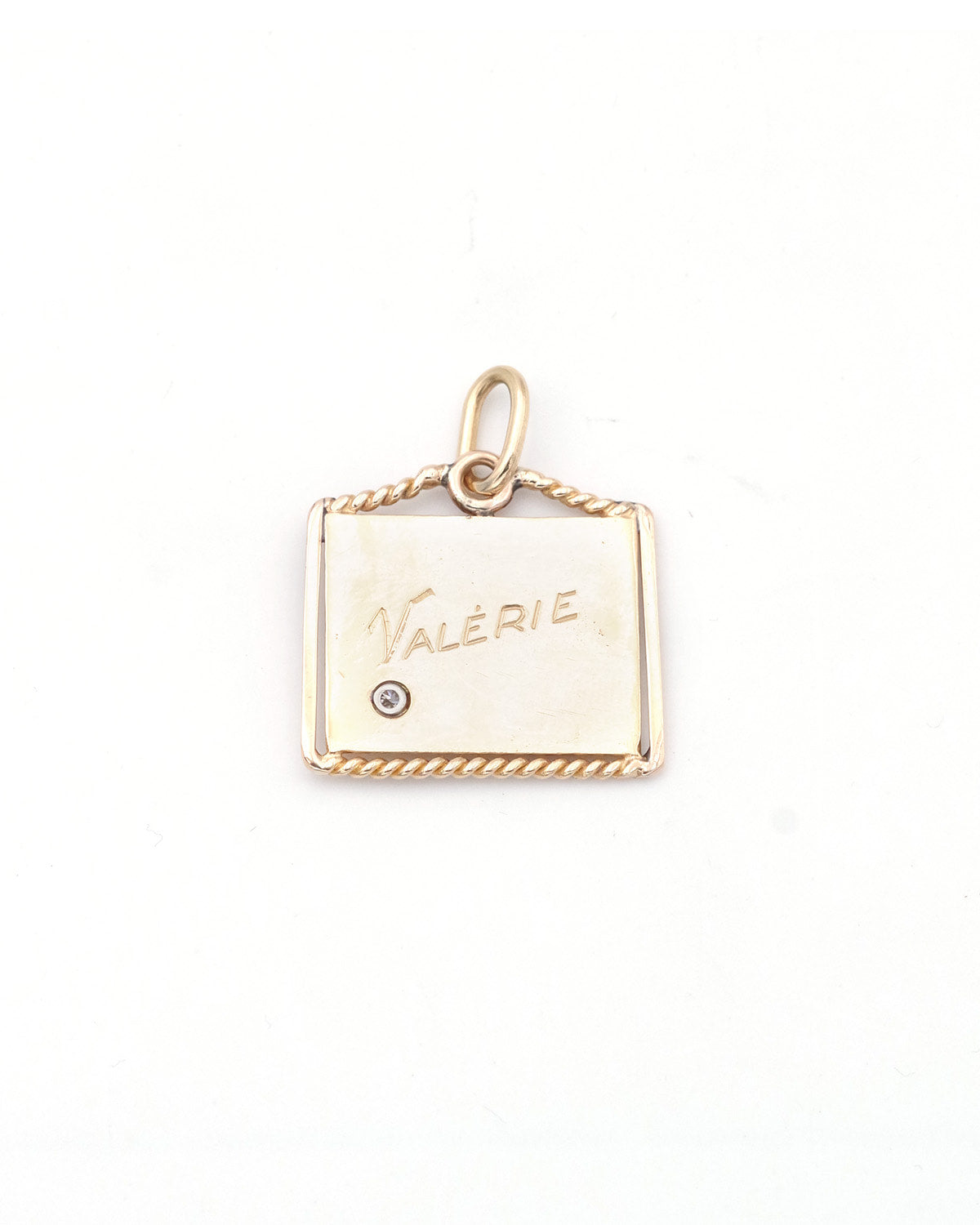 March calendar gold pendant