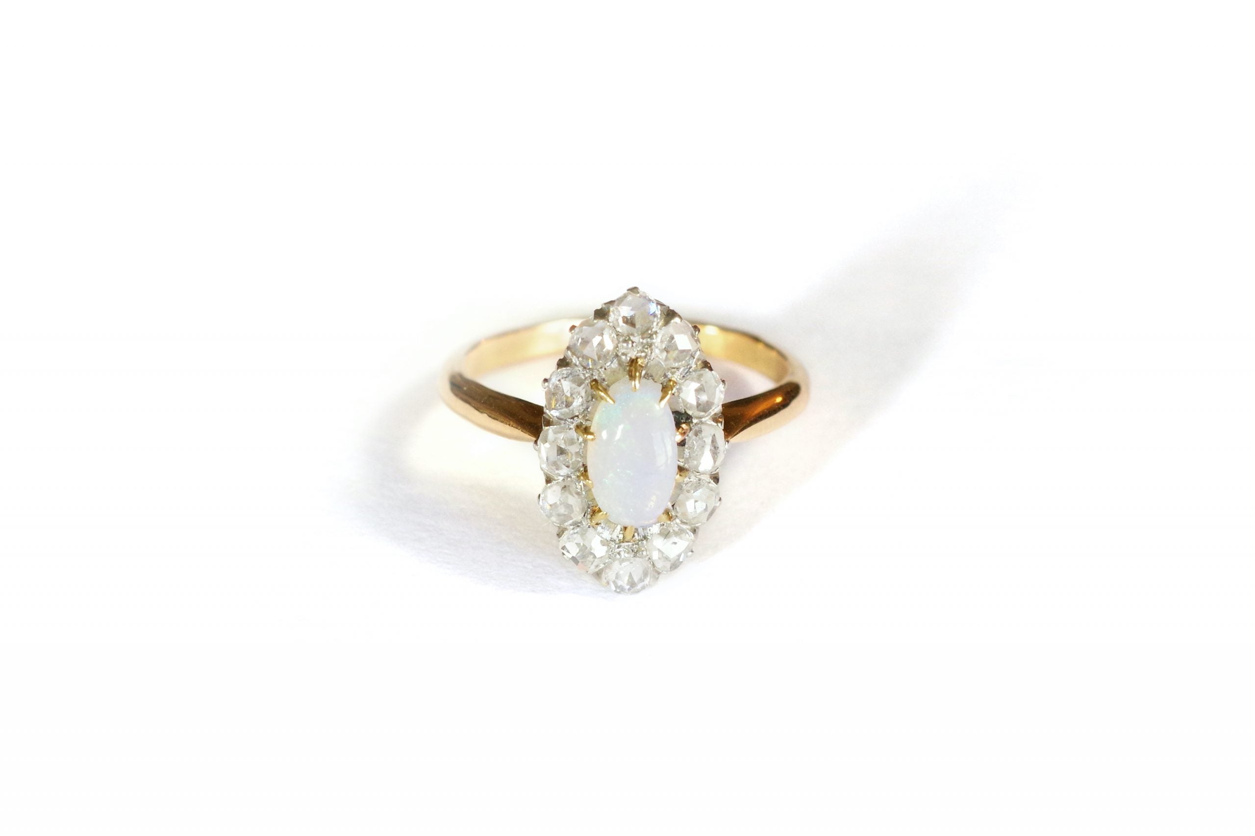 opal diamond cluster ring in platinum