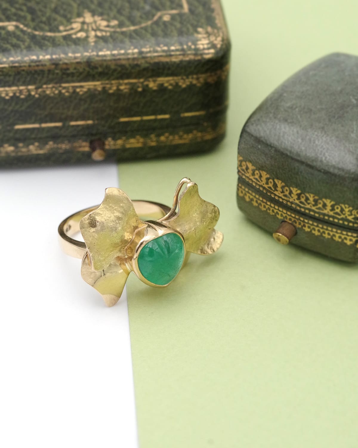 emerald cocktail bow ring in gold