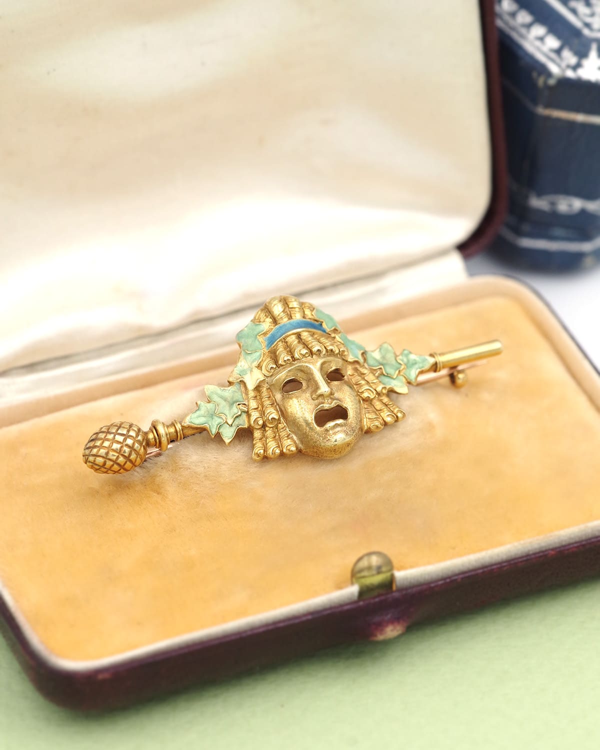 Art Nouveau theater mask brooch