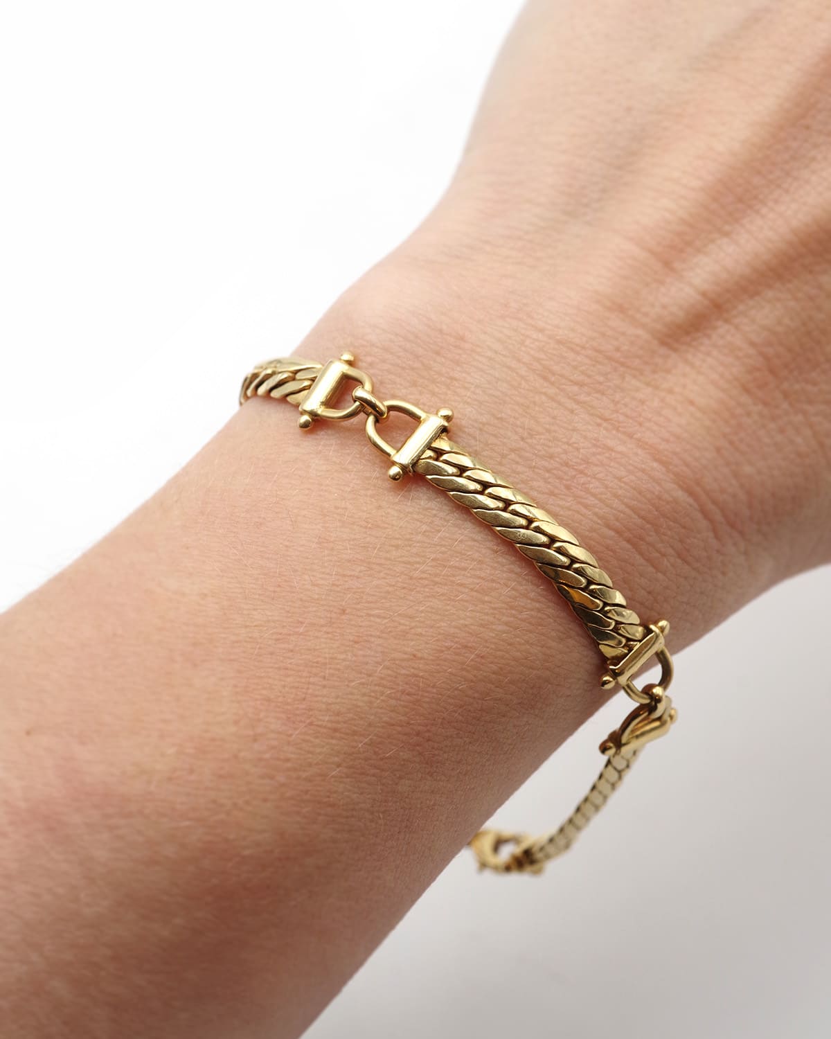 Gold horse bit bracelet