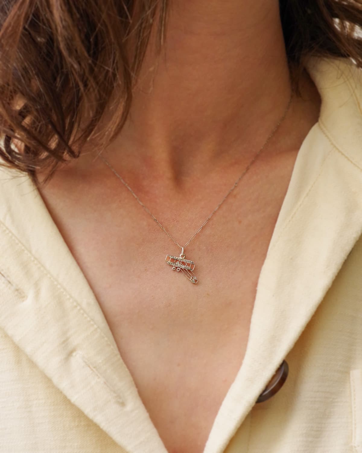 Aeroplane platinum diamond charm by cartier