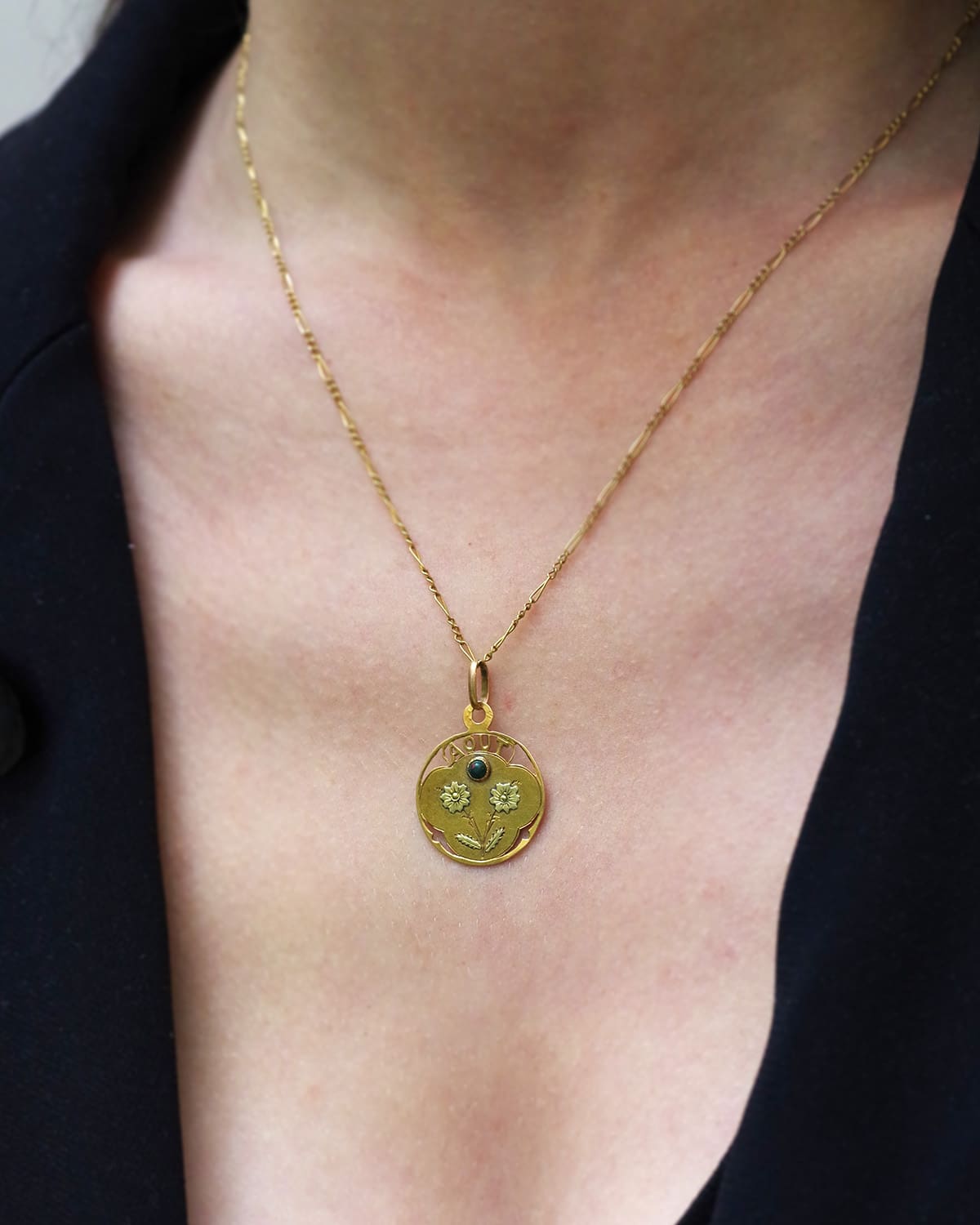 August birth medal in gold