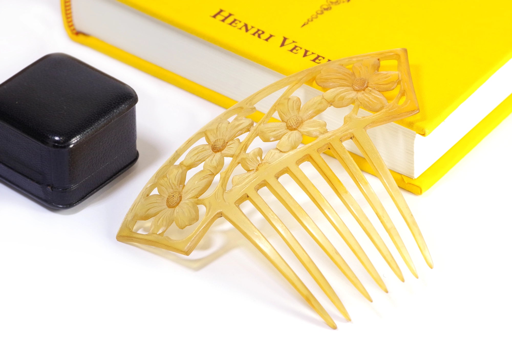 Horn hair comb signed