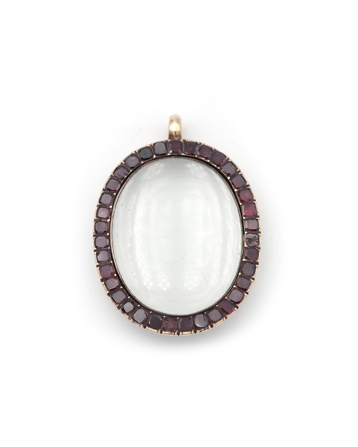 Magnifying glass garnet pendant 