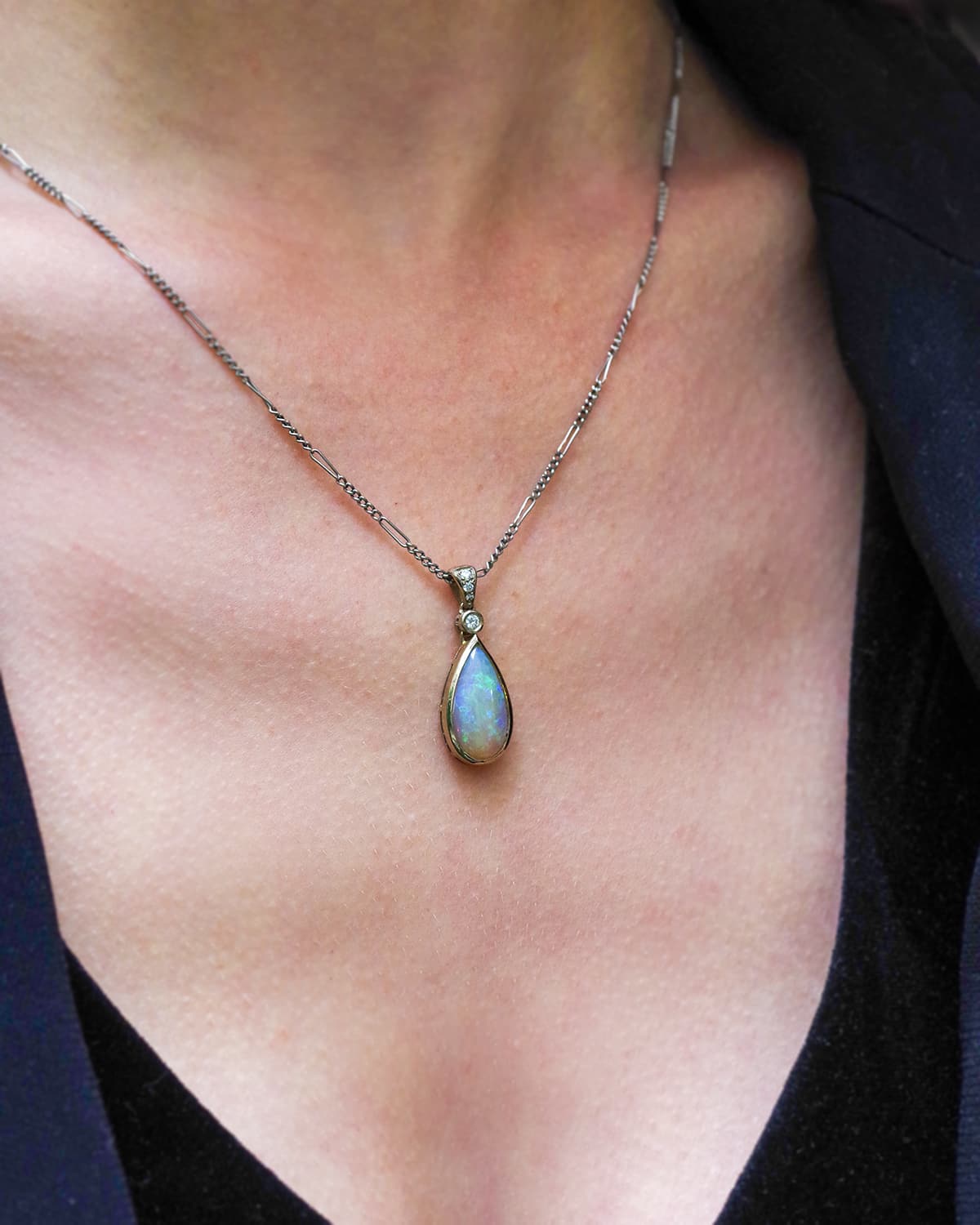 Opal diamond pendant