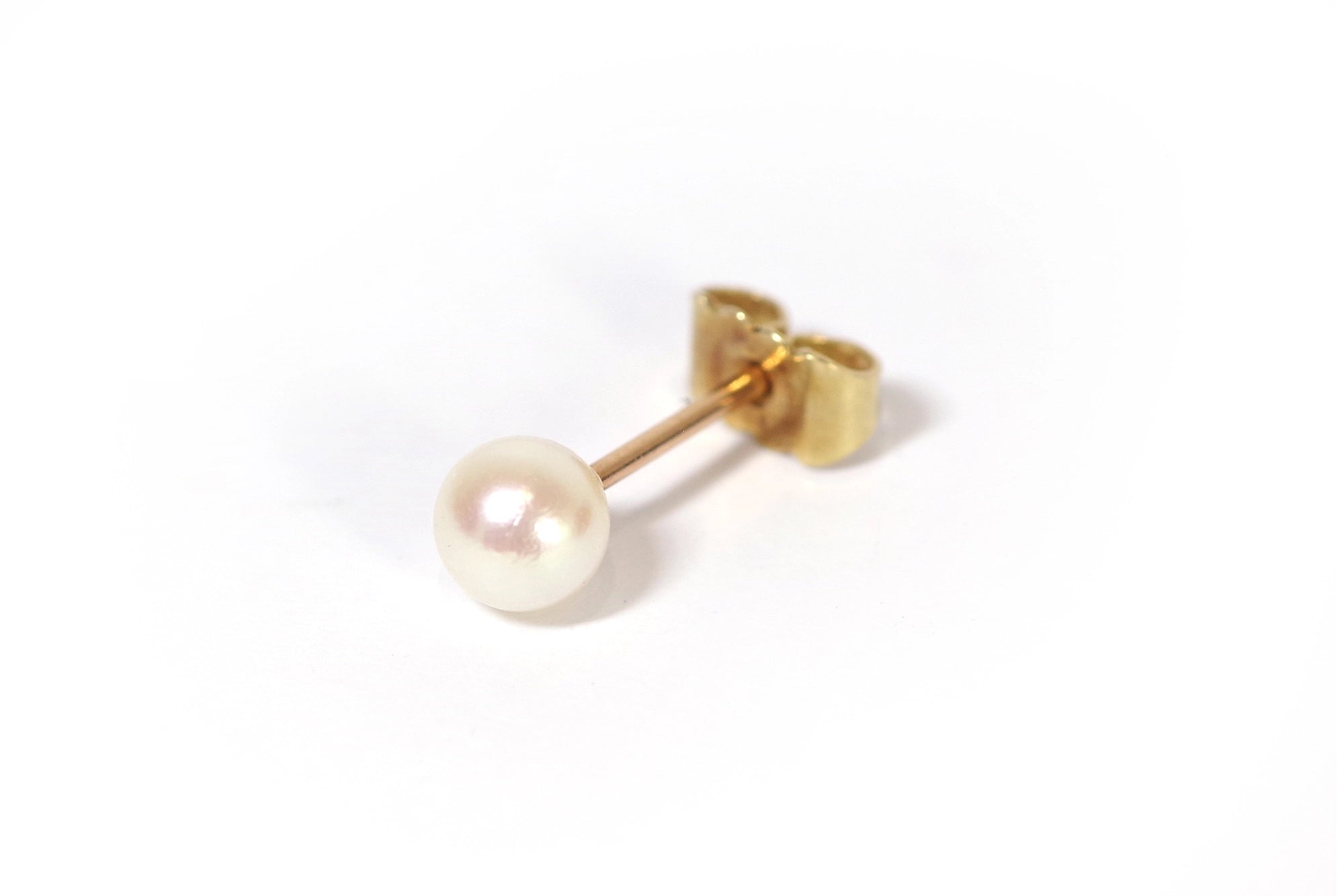 pre-owned stud earrings in gold