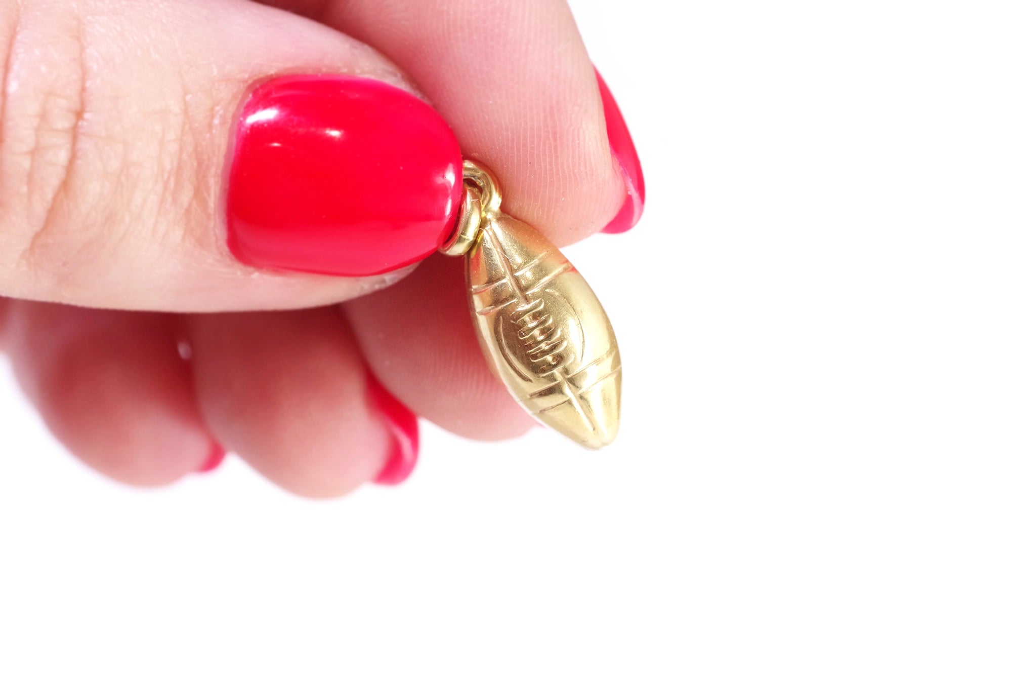 rugby ball pendant in gold