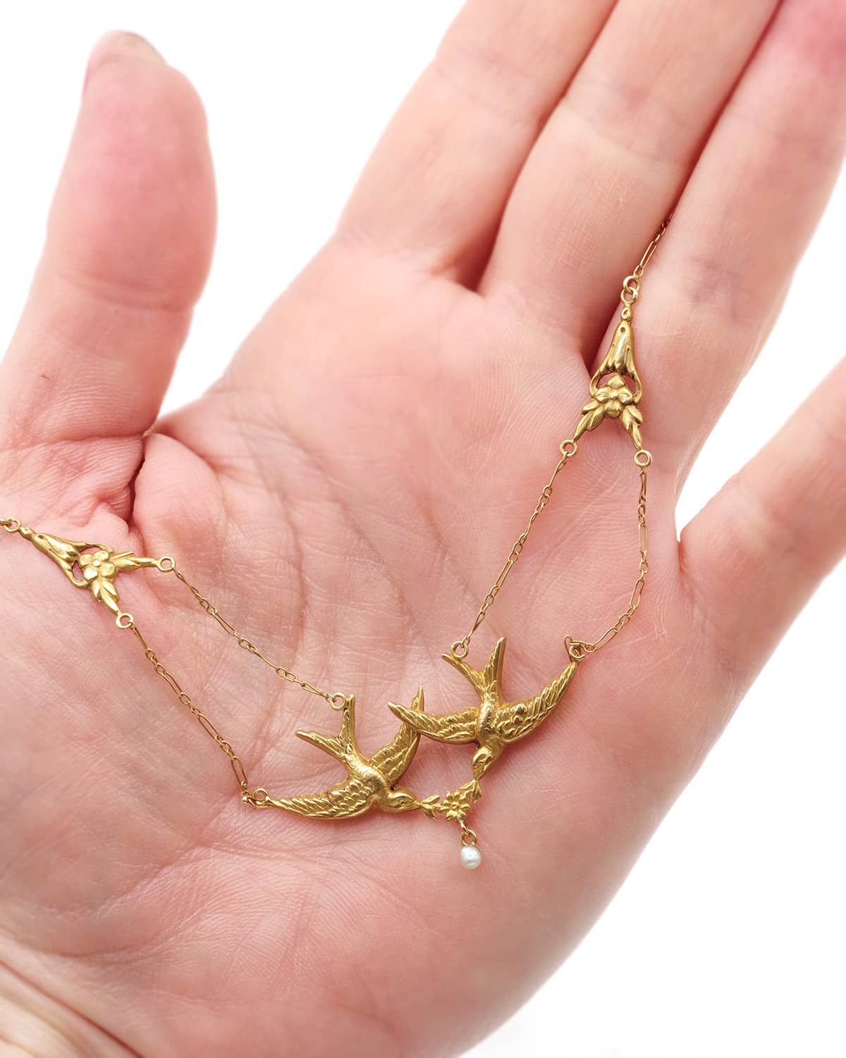 Antique swallow necklace in gold