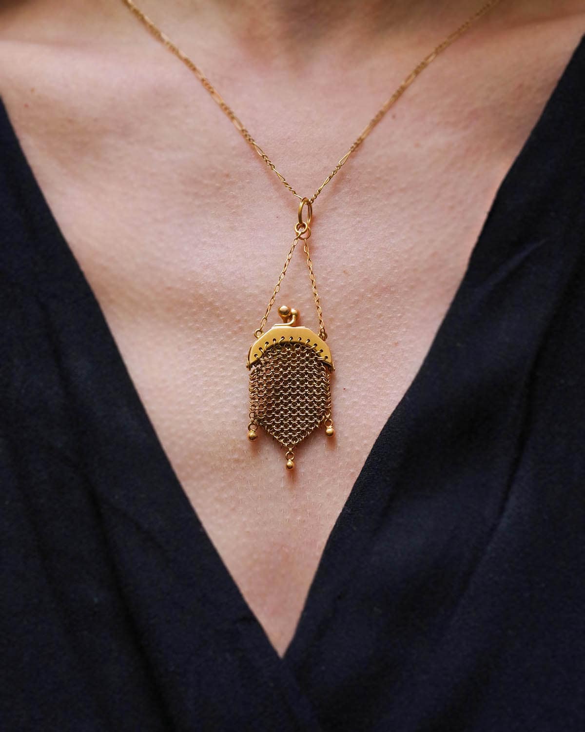 bourse de poupée en or