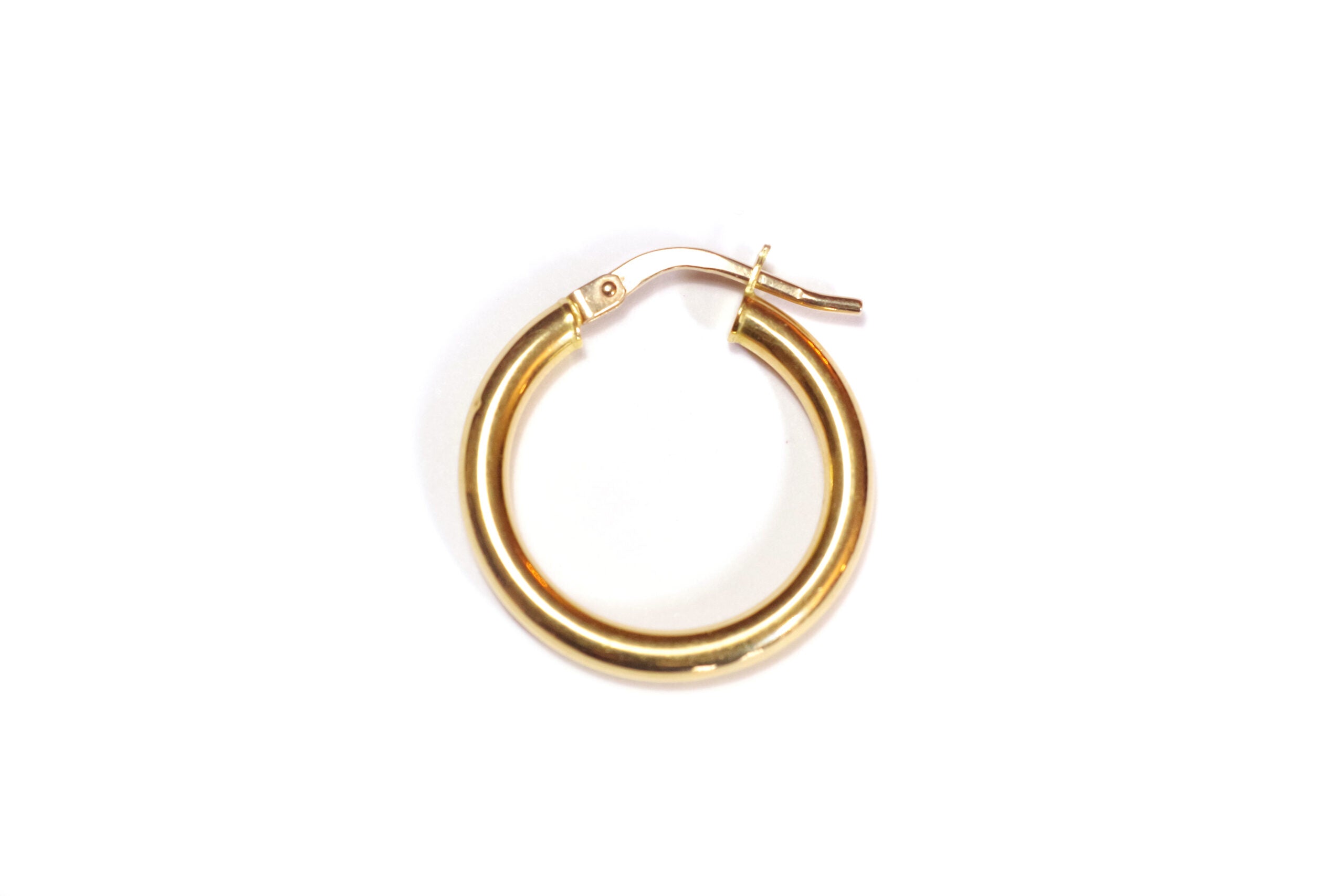 pre-owned vintage hoop earring, mono earring