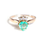 emerald crowned ring in gold