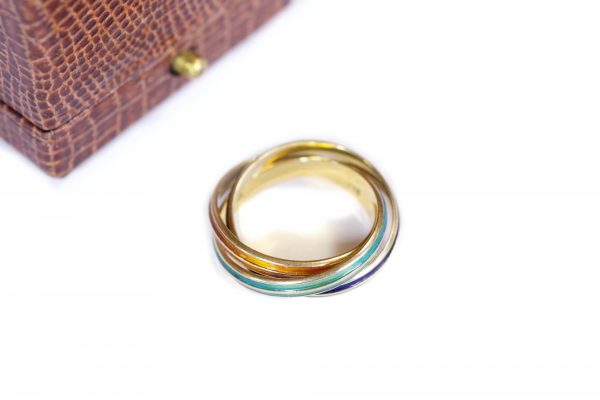 pre-owned cartier trilogy ring in gold enameled