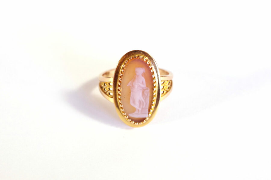antique cameo ring woman plays aulos