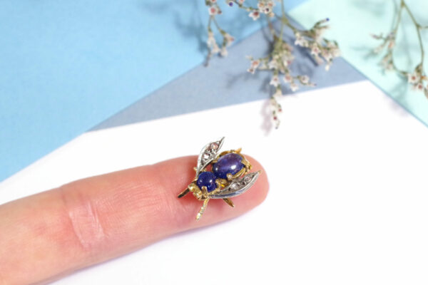 bee or fly brooch with diamonds and sapphire