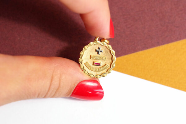 vintage love medal less than today more than tomorrow in gold and rubies