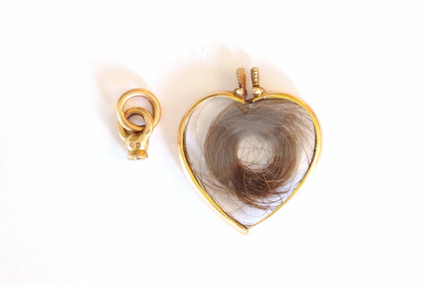 photo gold locket with a lock of hair
