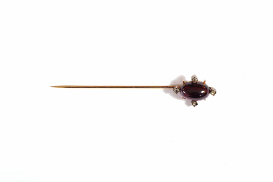 antique men tie pin with a garnet and diamond