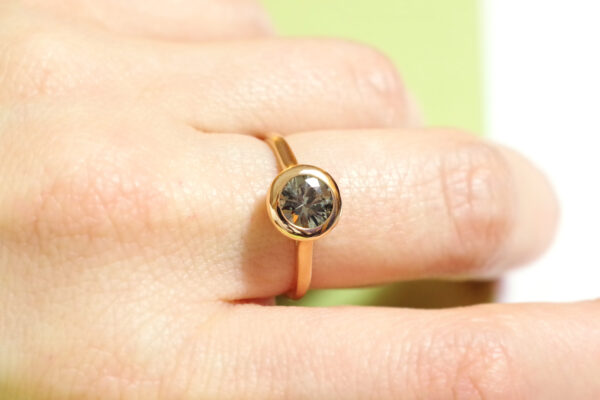 green sapphire ring solitaire in gold