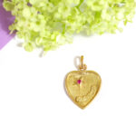 vintage love medal in gold and ruby