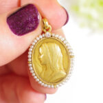art nouveau medal representing the holy Virgin Mary
