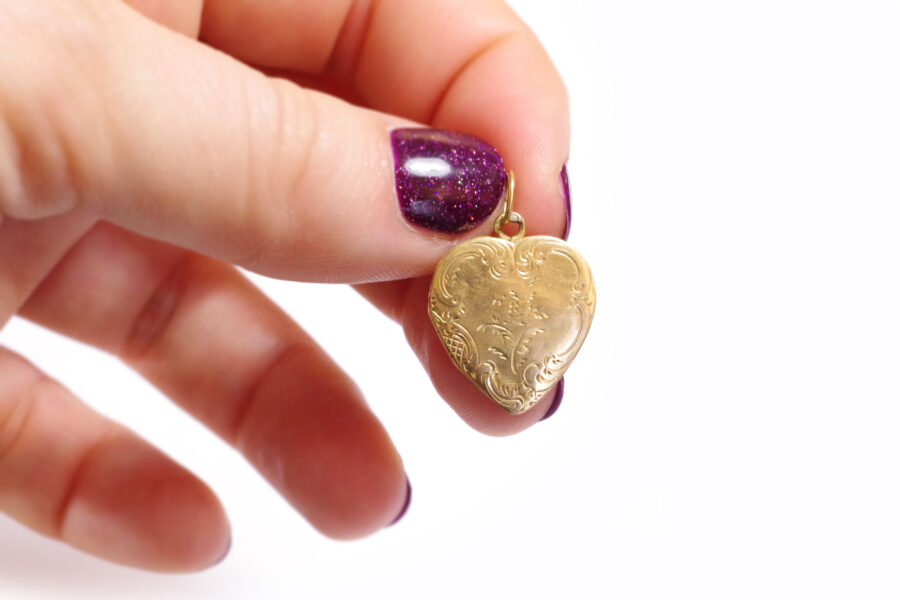 antique secret heart shape locket in gold