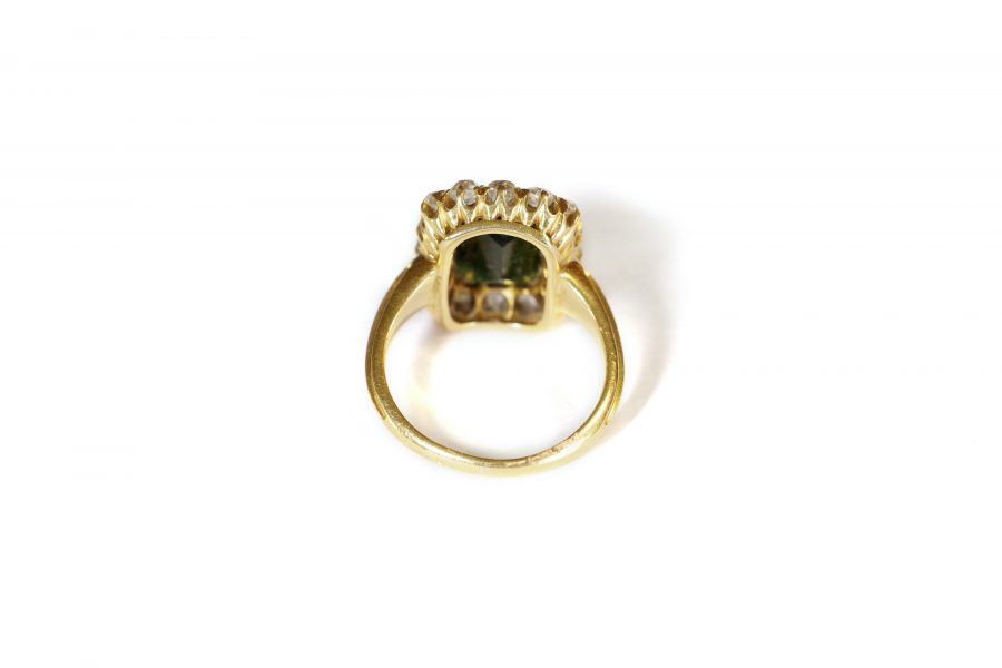 green tourmaline diamond cluster ring in gold
