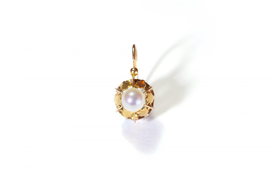 antique single earring with a pearl