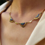 peacock feathers necklace in gold