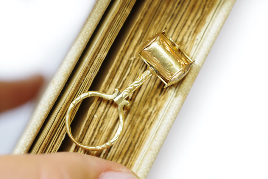 secret magnifying glass pendant in gold
