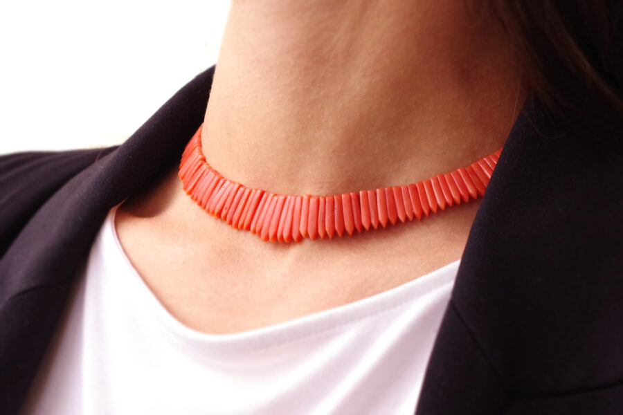 art deco coral necklace with a gold clasp
