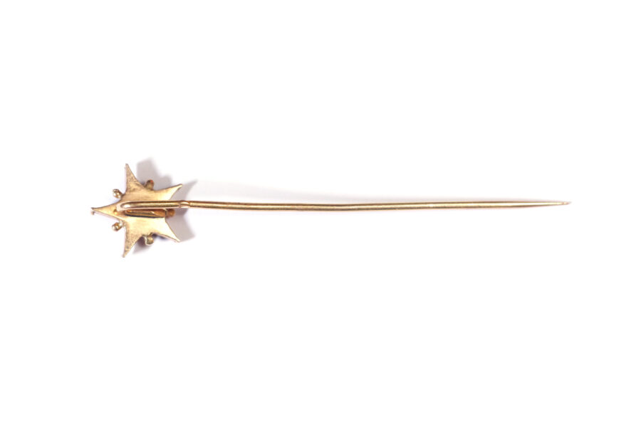 Antique star stick pin in gold