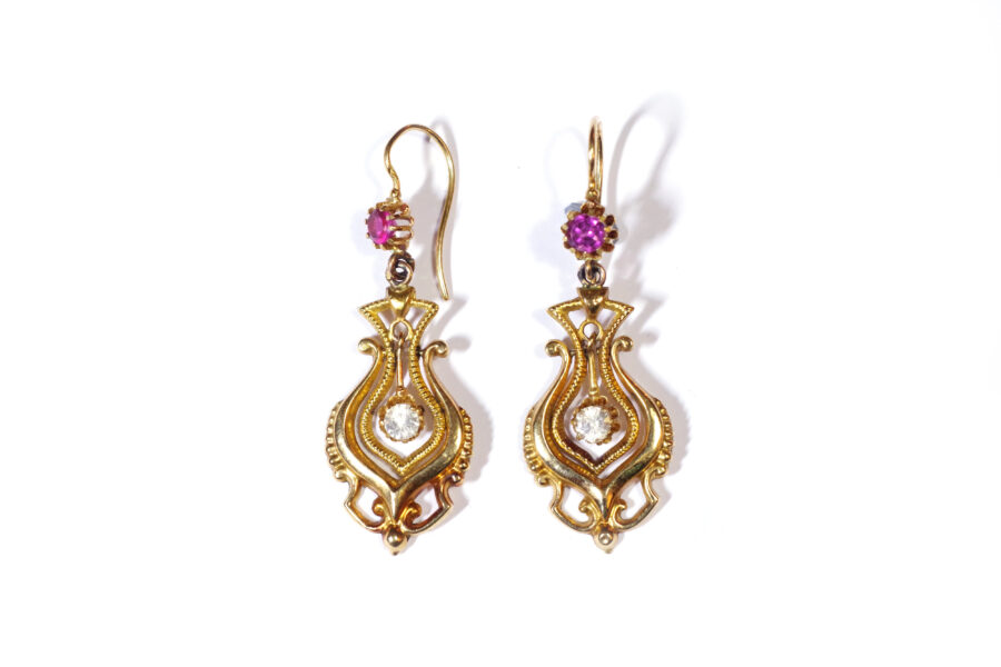 dangle earrings set with garnets