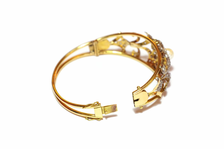 pearl bangle bracelet in gold