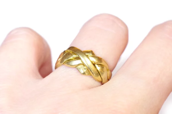 4 band puzzle ring in gold