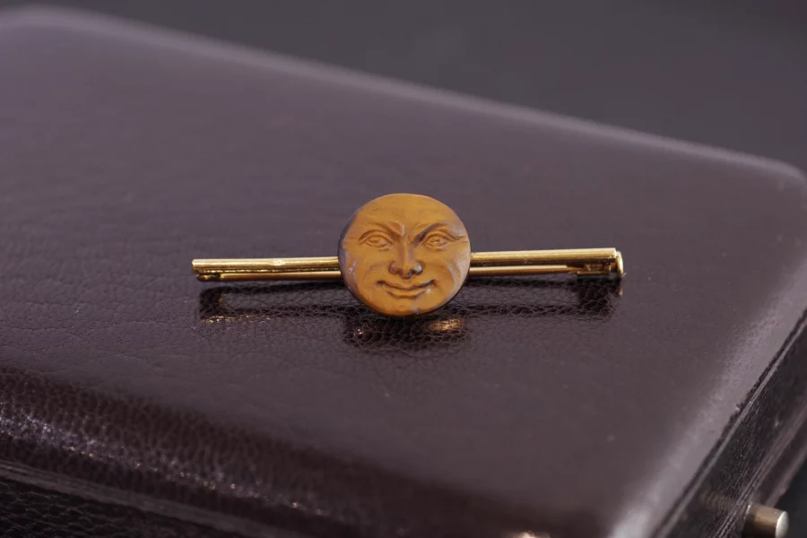 antique man on the moon brooch