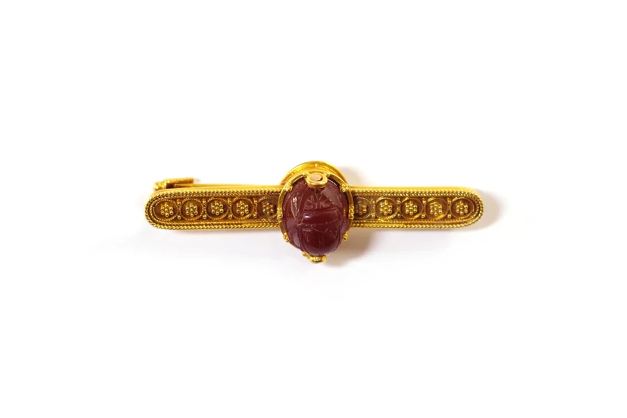 gold carved scarab brooch