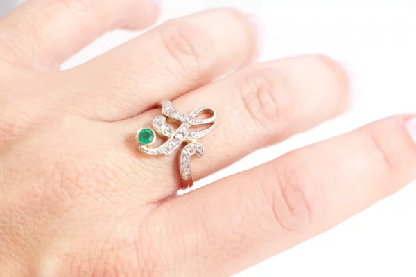 Antique emerald diamond ring in platinum