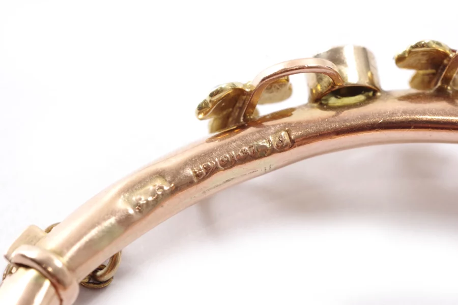 Peridot gold clover bangle bracelet