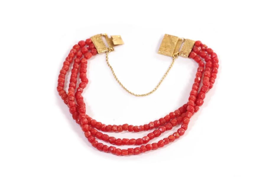 gold clasp coral strands bracelet